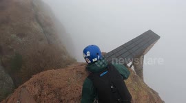 BASE Jumping Into Low-Lying Clouds