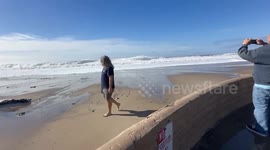 US: Beachgoers Flee As High Waves Crash Onto Road In Ventura, California
