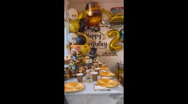 French Bulldog celebrates birthday in construction outfit and birthday theme