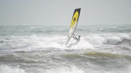 Surfers make the most of Storm Gerrit conditions on Avon beach in Christchurch, UK