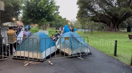 People queue overnight to get a good position for New Years Eve in Sydney, Australia