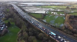 New Years Eve traffic misery as 100s of drivers are trapped on motorway following crash - Derbyshire UK