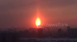 Rare natural event - the sun as a candle on New Year Eve in St Petersburg, Russia