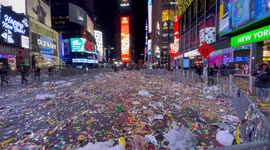 Confetti-strewn, empty Times Square seen 44 minutes after midnight
