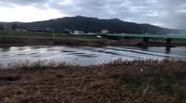 Japan earthquake causes waves on river amid tsunami approaches