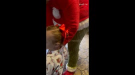 The Grinch's unexpected interaction with Cindy Lou is adorned with innocence