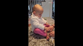 Adorable baby girl loses herself to the music when mom plays her favorite song
