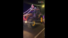 Beautifully decorated tractors plow ahead with Christmas charity run