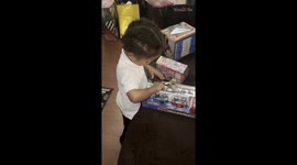 Impatient kid comes up with fork-tastic way to open his Christmas gift early