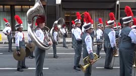 Musicians wait outside The Ritz at the start of London New Year's Day Parade 2024