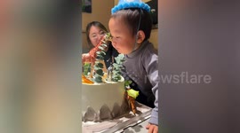 Boy nearly burns mouth as he tries to blow out birthday candle