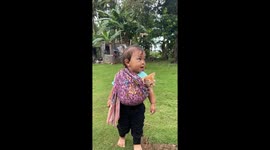 Adorable one-year-old plays 'mom' to cat in heartwarming video