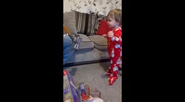 Toddler bubbles with glee after being surprised with a mini Dyson Hoover