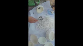 A woman created a very quick coconut peeling machine from just small iron bars