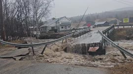 Bridge Destroyed By Raging Floodwaters