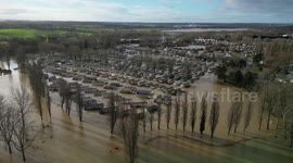 Drone footage shows homes at the Billing Aquadrome flooded by water following Storm Henk
