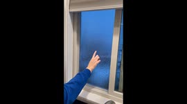 Ice Freezes Over Window Screen