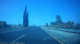Overtaking Car Crashes into Barrier