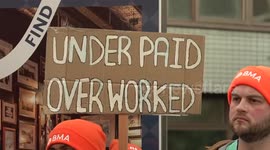 Junior doctors strike outside St Thomas' Hospital in London, UK