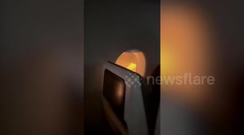 Video shows inside Japan Airlines plane which burst into flames after colliding with coast guard aircraft