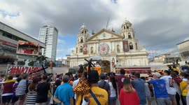 Blessing of the replicas of Black Jesus during the week-long celebration of the Feast of Black Nazarene