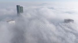 Time-lapse Skyscrapers Looming in Heavy Fog in Nanjing, China