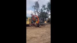 Excavator driver demonstrates his professional excavator driving skills