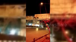 Protestors Set Alight Banner Hailing Spy Chief in Mashhad, Iran