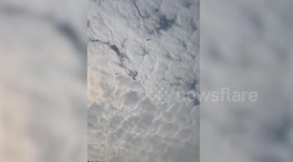 Satellite debris bursts into flames after crashing in forest area near Chinese village