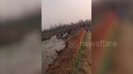 Children injured when playground train overturns into pond in China