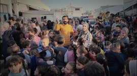 Children take part in activity inside refugee camp set up in Gaza's Khan Yunis