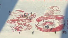 Locals craft massive snow dragon to welcome new year in China