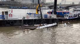 Storm Henk: downpour sinks a party boat at Temple Pier in London