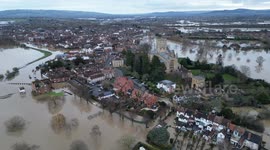 Historic Tewkesbury surrounded by flood water in the wake of Storm Henk