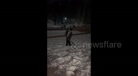 China: Man Creates Artificial Aurora Using Snow