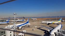 Japan: Smoke Billows From Crashed JAL Plane In Haneda Airport During Dismantling Operations