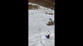 Snowboarder Chases Runaway Snowboard