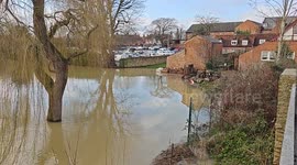 Flooding in Riverside, Newport Pagnell, Buckinghamshire, following Storm Henk