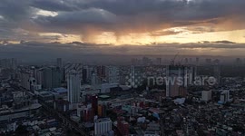 Stunning timelapse video of sunrise with fair weather waterspouts in Quezon City