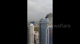Philippines: Fire Erupts On Roof Deck Of High Rise In Makati CBD, Metro Manila