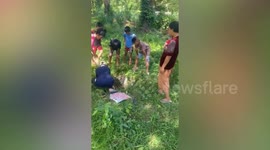 Teenagers rescue stray dog stuck in bottom of well