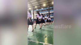 Schoolgirls impress classmates with supermodel-like walks to prepare for sports day