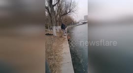 Taxi driver praised for risking life to rescue elderly man from frozen river