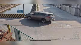 Woman escapes drowning by climbing on car roof after crash