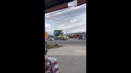 Dust devil tornado whips debris into air as it rips through market