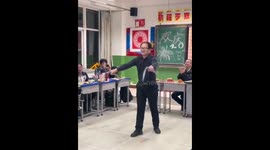 Maths Teacher Wows High School Students with Nunchaku Performance at New Year's School Party