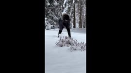 Husband films Brazilian wife excitedly building her first snowman at 43-years-old