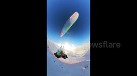 China: Stunning Ice Halo Spotted During Paraglider Ride At Jiangjunshan Mt. In Xinjiang