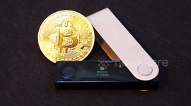 Bitcoin is ready a physical Bitcoin coin & a Ledger Nano X cryptocurrency hardware wallet ready to send or receive BTC ahead of the BTC Halving