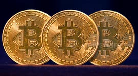 Zooming in on 3 Bitcoin physical Gold coins ahead of the BTC Halving when the daily Bitcoin mined is cut in half from 900 to 450 Bitcoin per day